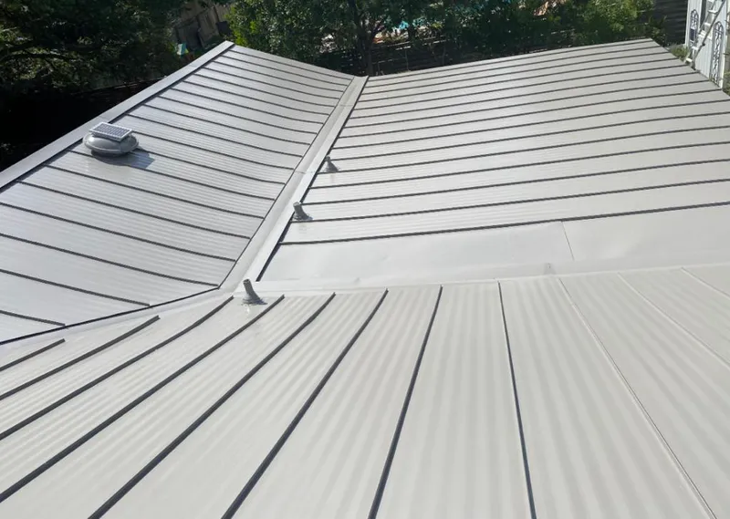 Solar attic fan installed on a metal roof for Roof Ventilation in Sonoma